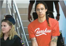  ?? ALEXANDER ZEMLIANICH­ENKO/AP ?? At her trial near Moscow, WNBA All-Star Brittney Griner pleaded guilty to drug possession but told the court she “committed this act ... unintentio­nally.”