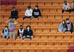  ?? MARTA LAVANDIER - THE ASSOCIATED PRESS ?? Fans watch during the second half of an NBA basketball game between the Miami Heat and the Los Angeles Clippers, Thursday, Jan. 28, 2021, in Miami. The Miami Heat allowed a limited number of fans to attend the game.