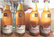  ?? MILWAUKEE JOURNAL SENTINEL MARK HOFFMAN, ?? Forward Cider has two styles sold in 750-milliliter bottles: Bare Brut and Cuvee Cru.