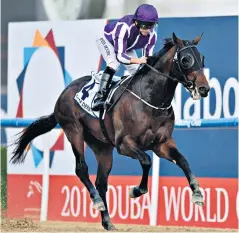  ??  ?? Dynamic duo: Ryan Moore rides Mendelssoh­n to victory at Meydan last night