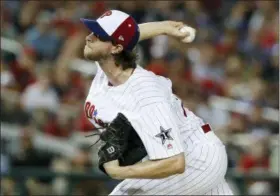  ?? ALEX BRANDON — THE ASSOCIATED PRESS ?? All-Star pitcher Aaron Nola is confident the Phillies have what it takes to hold off the Atlanta Braves and Washington Nationals and win the N.L. East pennant.