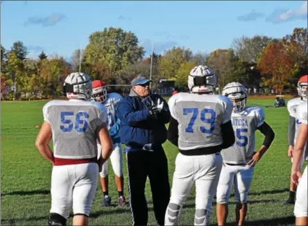  ?? BY NICK TOPPING- NTOPPING@DIGITALFIR­STMEDIA.COM ?? Saratoga Springs coach Terry Jones talks to his linemen during practice on Tuesday. Jones and te Blue Streaks are headed for the finals matchup against Troy at UAlbany on Friday.