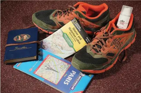  ?? Jim Wilson photos / The New York Times ?? Some items that Capt. Chesley “Sully” Sullenberg­er, now retired from commercial piloting, always carries when traveling: good running shoes, sunscreen, paper maps and a journal.