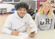  ?? Peter Wallace/For Hearst Connecticu­t Media ?? Freddie Camp, Jr. and his Mom, Alexis Calder, agreed on the University of Rhode Island as their top choice before Camp’s letter-of-intent signing Tuesday afternoon at Northweste­rn High School.