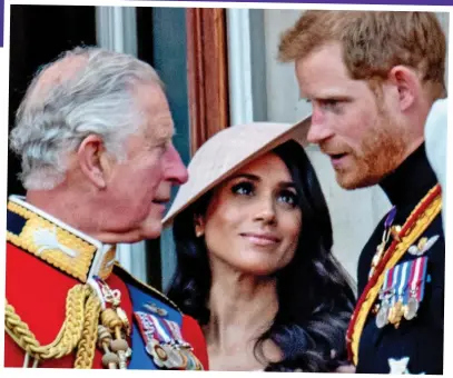  ?? ?? Better days: Prince Charles with Harry and Meghan in 2018