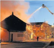  ?? ANDREW JAMES ?? The fire at a furniture store on City Road in Cardiff