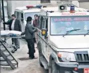  ??  ?? Bodies of Indian tourists being taken into an ambulance for postmortem at a hospital in Kathmandu on Tuesday.
AP