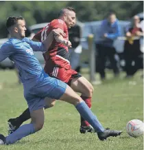  ??  ?? Southwick (red) battle against RCA Grangetown Florists in last week’s Total Sport Challenge Cup final.