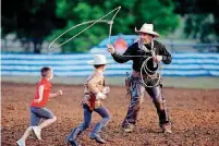  ??  ?? Trick roper Kowboy Kal performs during Pawnee Bill’s Wild West Show.