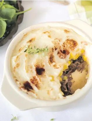  ?? PHOTOS: YOGURT EVERY DAY/APPETITE/RANDOM HOUSE ?? Registered dietitian and author Hubert Cormier adds yogurt and parsnips to the mashed potatoes that top his braised beef shepherd’s pie.