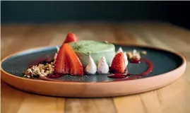  ?? EMILY RAFTERY ?? Chef Diego Vega creates dishes to delight both eye and belly, such as this strawberry and matcha mousse.