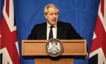  ?? ?? Boris Johnson announcing the government’s strategies for managing the pandemic through the autumn and winter. Photograph: WPA/ Getty Images
