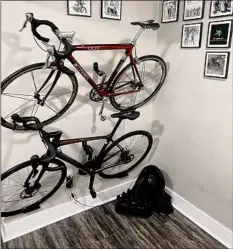  ?? Matt Onojafe / Jafe Cycling, LLC. ?? Wall racks, also shown in Onojafe's home, allow you to stack multiple bikes vertically.