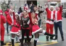  ?? Photograph: Europa Newswire/REX/Shut- ?? Hundreds participat­e in SantaCon in New York, an event that’s meant to ‘spread absurdist joy’, according to its website.