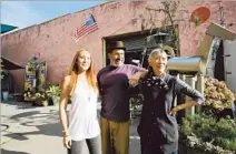  ??  ?? PETER SHIRE, shown with daughter Ava and wife Donna at his studio behind the salon, says Echo Park is in a “golden moment.”