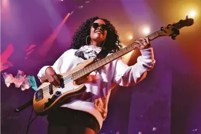  ?? Tim Mosenfelde­r / Getty Images 2019 ?? H.E.R. performs during the first Lights On Festival, the event the Vallejo native curates at Concord Pavilion.