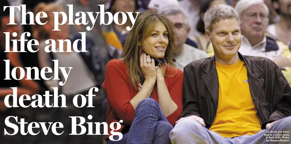  ??  ?? Liz Hurley and Steve Bing at a Lakers game in April 2001. Photo: Jim Ruymen/Reuters