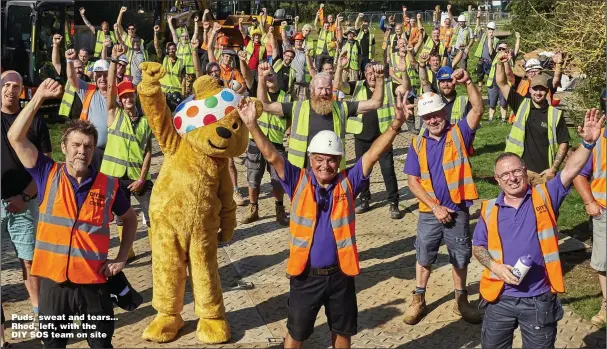  ?? Pictures: NEIL SHERWOOD ?? Puds, sweat and tears… Rhod, left, with the DIY SOS team on site