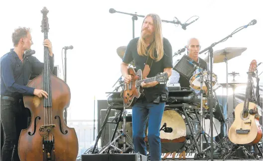  ?? BRIAN HINELINE ?? The Wood Brothers, shown here performing at WXPN’s XPoNential Music Festival, will play Musikfest’s WInd Creek Steel Stage Aug. 14.