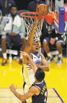  ?? Carlos Avila Gonzalez / The Chronicle ?? Kaleb Wesson puts up a shot against the Nuggets last week. Wesson is vying for a twoway contract with the Warriors.