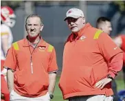  ?? Christian Petersen/Getty Images ?? Kansas City Chiefs defensive coordinato­r Steve Spagnuolo, left, talks with coach Andy Reid in a practice session prior to Super Bowl LVII at Arizona State University Practice Facility on Thursday in Tempe, Ariz.
