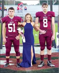  ?? Westside Eagle Observer/RANDY MOLL ?? Senior maid Laney Fredrick is escorted by seniors Garrett Hays and Jackson Bolinger at homecoming ceremonies at Gentry High School.