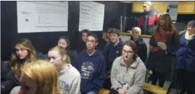  ?? BILL RETTEW - DIGITAL FIRST MEDIA ?? Rustin High School students watch their fellow classmates drive in a simulator.