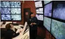  ??  ?? Staff monitor video screens at the main prison building. Photograph: Mikhail Svetlov/Getty Images