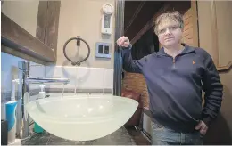  ?? PETER MCCABE ?? Lorne Weiner in one of his bathrooms where the water is always on during the winter to keep pipes from freezing at his home on Baderwood St. in Dollard-des-Ormeaux.