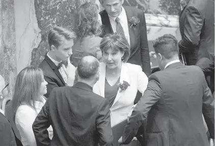  ??  ?? Premier Christy Clark speaks with colleagues prior to the throne speech on Thursday. Letter-writers have a variety of suggestion­s for ways the legislatur­e can move forward with a minority government.