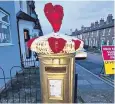  ?? ?? A postbox in Dartford ‘defaced’ by the phantom painter for Valentine’s Day