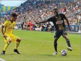  ?? MICHAEL REEVES — FOR DIGITAL FIRST MEDIA ?? Philadelph­ia Union midfielder Marcus Epps, right, drives at Columbus midfielder Hector Jimenez Wednesday. Epps scored his first MLS goal in a 3-0 win over the Crew.