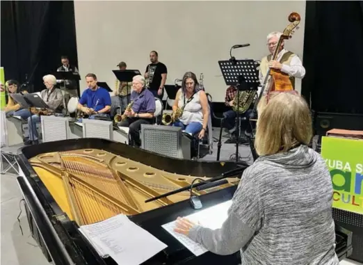  ?? ?? The Yuba-sutter Big Band jazz orchestra will be performing in Yuba City on Saturday to celebrate spring with a concert entitled “Love bugs and crazy daisies.”