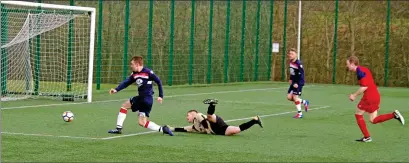  ?? Match report and photos: Derek Black ?? Scott Maitland rounds Rolls Royce keeper Conor Flanagan to level the scores.