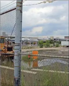  ?? ?? The lot along D Street in South Boston that was seized by the Massachuse­tts Convention Center Authority.