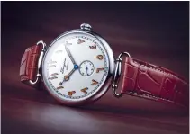  ??  ?? Based on a Heritage honey-colored model re-edition of a timepiece from 1918, this watch displays Arabic numerals.