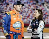  ?? AP PHOTO BY CHUCK BURTON ?? In this 2016, file photo, Danica Patrick, right, talks with Ricky Stenhouse Jr, before qualifying for Saturday’s NASCAR Sprint Cup series auto race at Charlotte Motor Speedway in Charlotte, N.C.