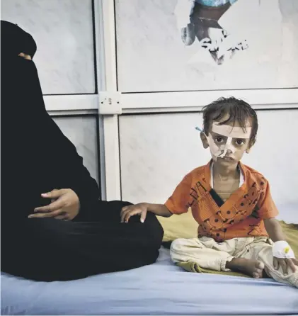  ??  ?? This young Yemeni boy, badly malnourish­ed, is caught up in ‘the world’s largest humanitari­an crisis’
