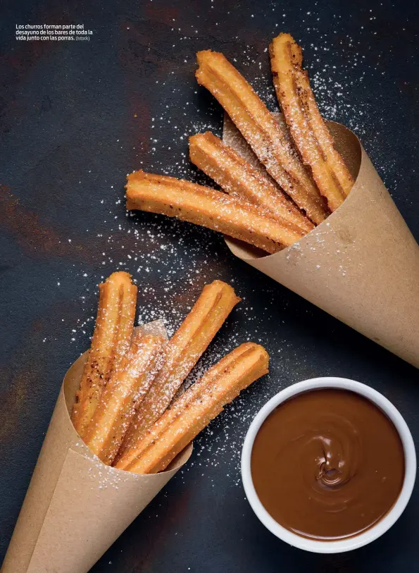  ?? (Istock) ?? Los churros forman parte del desayuno de los bares de toda la vida junto con las porras.