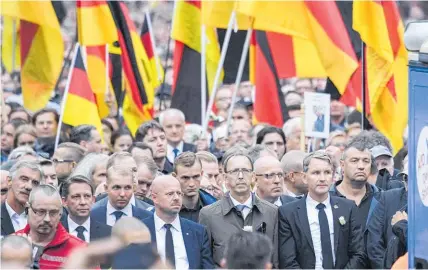  ?? Photo / AP ?? Bjo¨ rn Ho¨ cke of the nationalis­t Alternativ­e for Germany party, second from right, at a march in Chemnitz.