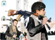  ??  ?? Child soldiers recruited by Yemen’s Houthi militias attend a rally in Sanaa on Jan. 14. (Reuters)