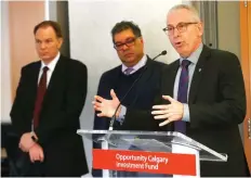  ?? DARREN MAKOWICHUK ?? From left, Barry Munro, Opportunit­y Calgary Investment Fund board chair, Mayor Naheed Nenshi and University of Calgary president Ed McCauley, at Wednesday’s grant announceme­nt.