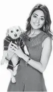  ?? Courtesy photo ?? KTRK-TV (ABC 13) morning anchor Rita Garcia with her rescue dog, Rocky