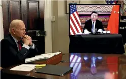  ?? AP ?? Chinese state media says that during a call to the White House, China’s President Xi Jinping warned President Joe Biden of becoming involved in Taiwan.