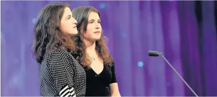  ??  ?? > Enlli and Alaw Lloyd Pugh from Botwnog who came first in the Cerdd Dant Duet over 21