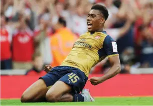  ??  ?? Super Eagles and Arsenal striker, Alex Iwobi celebrates after scoring for his club in the English Premier League