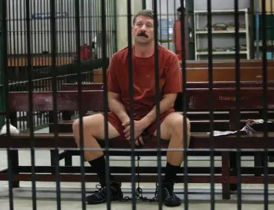  ?? The Associated Press ?? ■ Viktor Bout sits while waiting for his verdict in the detention room at a criminal court in Bangkok, Thailand, on Aug. 11, 2009. The Russian arms dealer who once inspired a Hollywood movie is back in the headlines with speculatio­n around a return to Moscow in a prisoner exchange for U.S. WBNA star Brittney Griner and former U.S. Marine Paul Whelan.