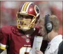  ?? The Associated Press file ?? Quarterbac­k Kirk Cousins and his offensive coordinato­r, Sean Mcvay, during a 2014 game when both were with Washington.