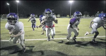  ??  ?? Warriors players run through drills Thursday. The teams played their final games of the regular season on Oct. 28. Each finished with a winning record.