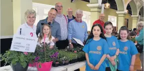  ??  ?? Blooming marvellous The Burgh Primary Rotakids with club members